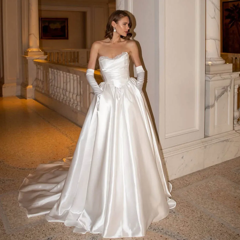 Luxurious Pleat Lace Aroud Sweetheart Satin Bridal Grown A Line Wedding Dresses Custom Made 2026 Vestido De Noival
Luxurious Pleat Lace Aroud Sweetheart Satin Bridal Grown A Line Wedding Dresses Custom Made 2026 Vestido De Noival
