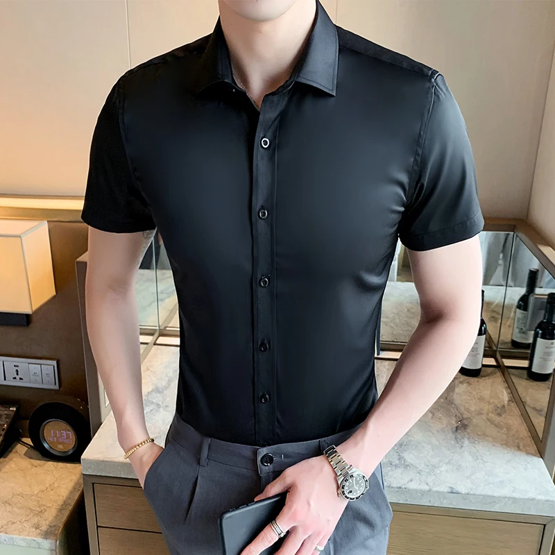 Летняя мужская рубашка Slim Fit, повседневная, однотонная, белая, из смесового полиэстера и хлопка, модная, для работы.
Летняя мужская рубашка Slim Fit, повседневная, однотонная, белая, из смесового полиэстера и хлопка, модная, для работы.