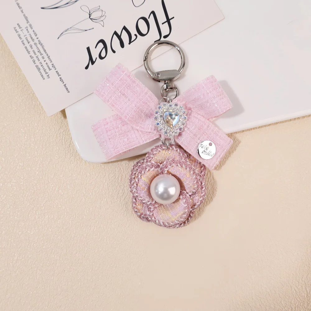 Light Luxury Small Fragrance Wind Anti Pearl Border Camellia Car Keychain Bag Pendant Decorative Accessories
Light Luxury Small Fragrance Wind Anti Pearl Border Camellia Car Keychain Bag Pendant Decorative Accessories