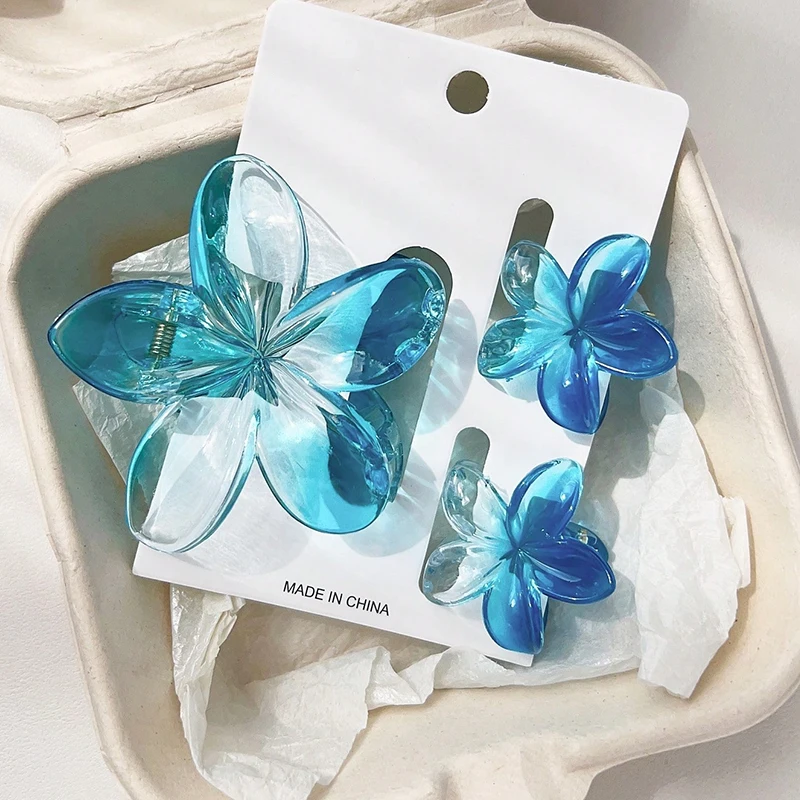 3pcs Shiny Ombre Translucent Blue Frangipani Flower Hair Claws, Big & Small Size, Beachy Spring/Summer Hair Clip Accessories
3pcs Shiny Ombre Translucent Blue Frangipani Flower Hair Claws, Big & Small Size, Beachy Spring/Summer Hair Clip Accessories