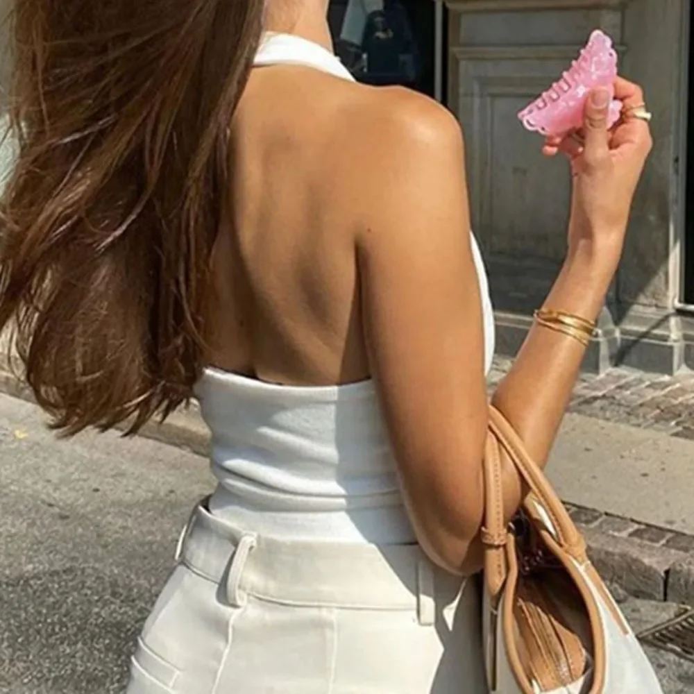 Women Sexy Halter Vest Knit U-neck Halter Backless Sleeveless Camosole Tank Crop Tops Show Chest Rib Knit Solid Color Slim Vest
Women Sexy Halter Vest Knit U-neck Halter Backless Sleeveless Camosole Tank Crop Tops Show Chest Rib Knit Solid Color Slim Vest