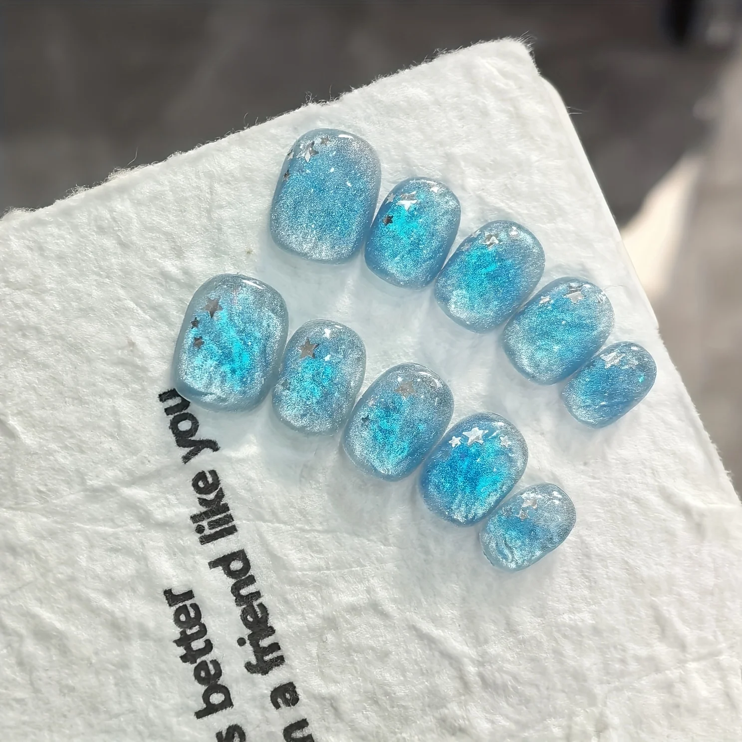 10pcs Handmade Press on Nail Ice Blue Ocean Star Ice-transparent Texture False Nail for Women&Girl Short Oval Wearable Nail
10pcs Handmade Press on Nail Ice Blue Ocean Star Ice-transparent Texture False Nail for Women&Girl Short Oval Wearable Nail