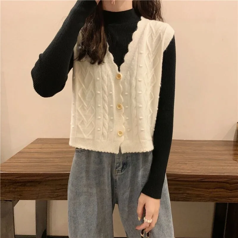 Свежий шикарный женский вязаный кардиган, жилет без рукавов, однотонная верхняя одежда с v-образным вырезом и пуговицами, короткая повседневная мода весна-осень 2025 г.
Свежий шикарный женский вязаный кардиган, жилет без рукавов, однотонная верхняя одежда с v-образным вырезом и пуговицами, короткая повседневная мода весна-осень 2025 г.