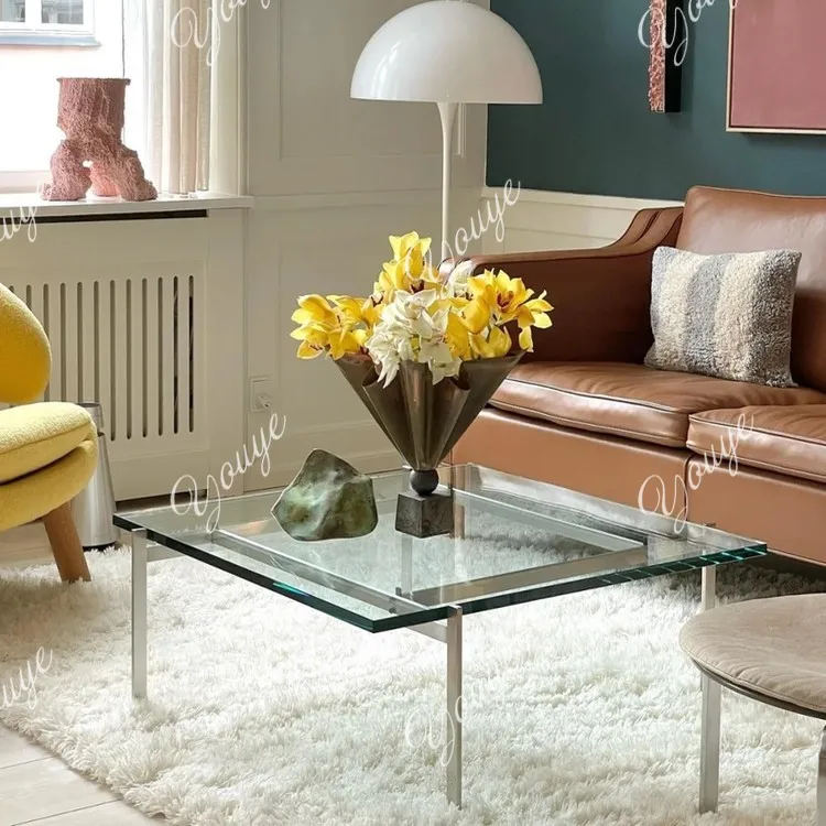 Small tea table coffee table designer glass stainless steel tempered glass small apartment color customization
Small tea table coffee table designer glass stainless steel tempered glass small apartment color customization