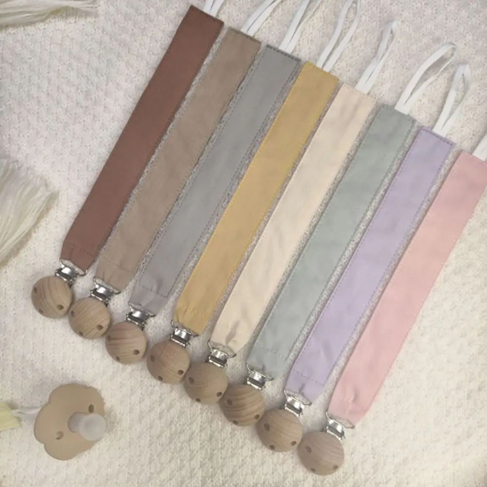 Solid Color Baby Cloth Pacifier Chain Wood Adjustable Soother Holder Dummy Clips Teether Toys Straps Nipple Holder Clips
Solid Color Baby Cloth Pacifier Chain Wood Adjustable Soother Holder Dummy Clips Teether Toys Straps Nipple Holder Clips