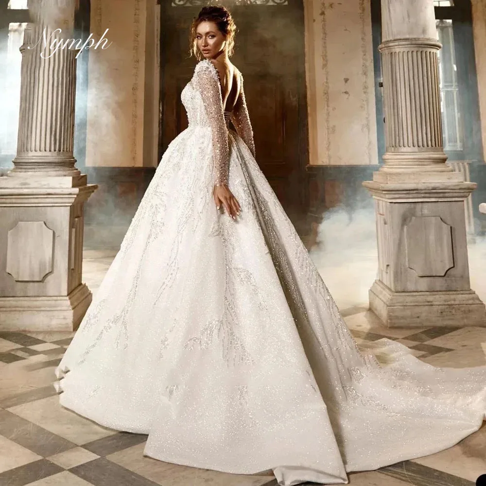 Customized Luxury Long Sleeve 2025 Wedding Dress Boat Neck Robe Lace Embroidery Ball Gown Bride Gowns Vestidos De Noiva
Customized Luxury Long Sleeve 2025 Wedding Dress Boat Neck Robe Lace Embroidery Ball Gown Bride Gowns Vestidos De Noiva