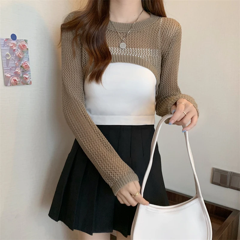 Women's Summer Hollow Out Knitted Cardigan Long Sleeve Sun Protective Short Chic Sexy Top Niche Design
Women's Summer Hollow Out Knitted Cardigan Long Sleeve Sun Protective Short Chic Sexy Top Niche Design