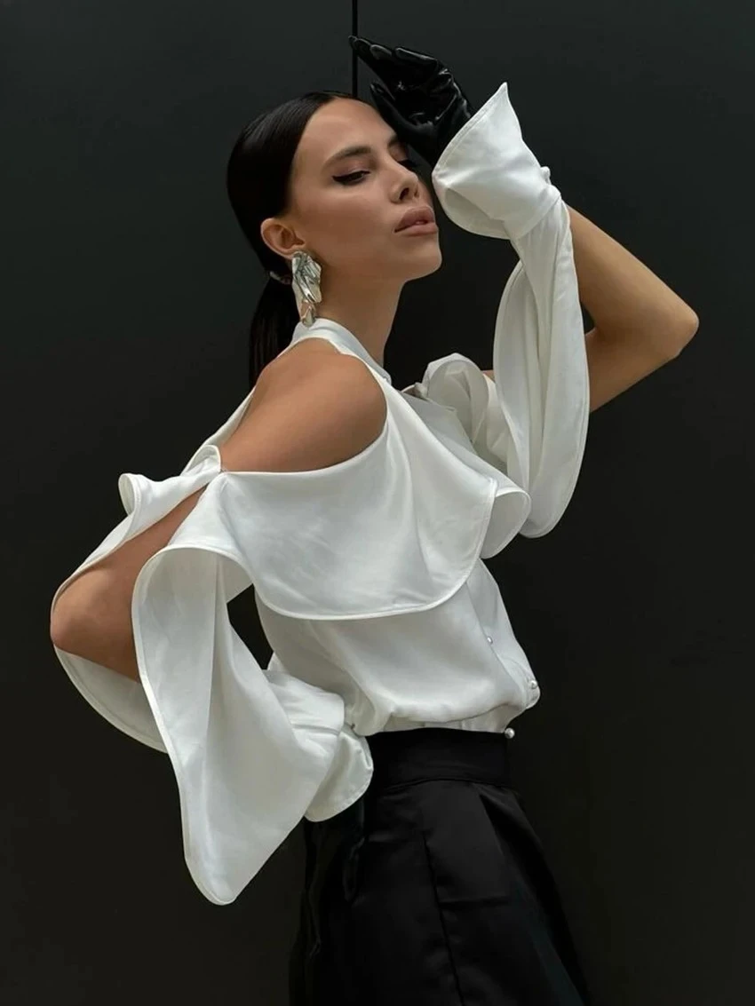 Spring/Summer Women's Fashion Sexy Hanging Neck Top With Ruffle Edge Round Neck Off The Shoulder Long Sleeved Design White Shirt
Spring/Summer Women's Fashion Sexy Hanging Neck Top With Ruffle Edge Round Neck Off The Shoulder Long Sleeved Design White Shirt