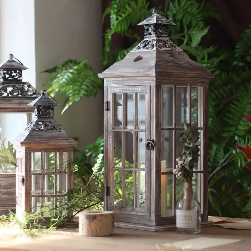 European style old iron art wooden windproof candle stand glass floor to ceiling wind lamp wedding props home decorations
European style old iron art wooden windproof candle stand glass floor to ceiling wind lamp wedding props home decorations