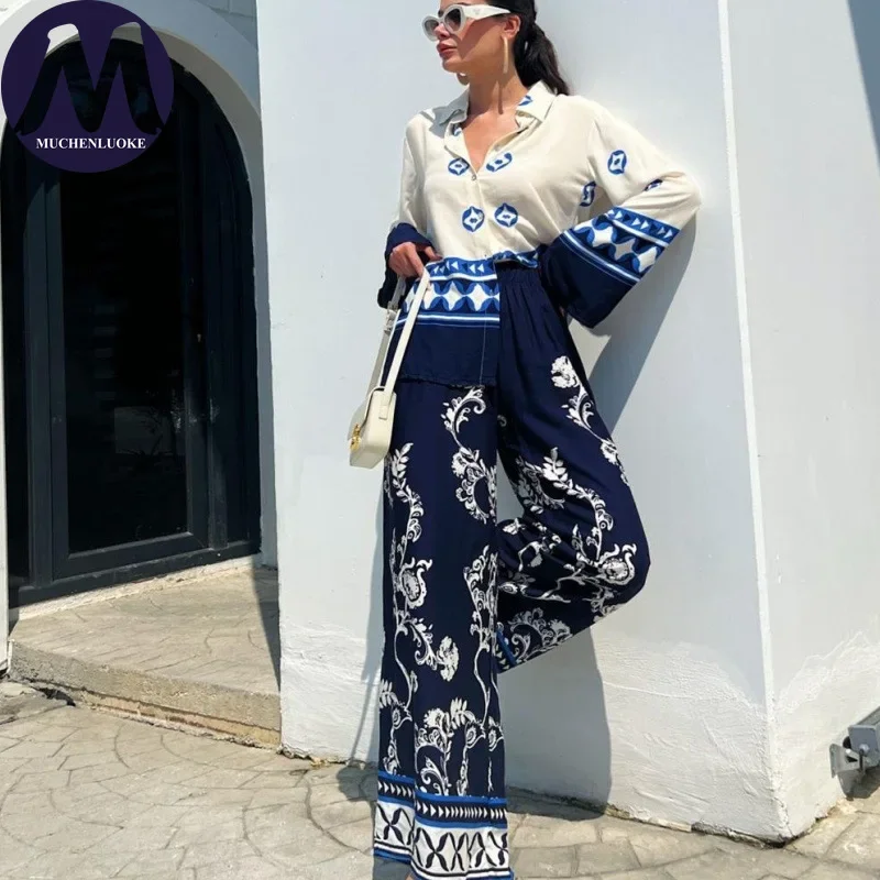 Комплект из 2 предметов для женщин, новинка лета 2025 года, рубашка с длинными рукавами и лацканами с принтом, топы, костюмы, модные повседневные свободные комплекты с широкими брюками 
Комплект из 2 предметов для женщин, новинка лета 2025 года, рубашка с длинными рукавами и лацканами с принтом, топы, костюмы, модные повседневные свободные комплекты с широкими брюками