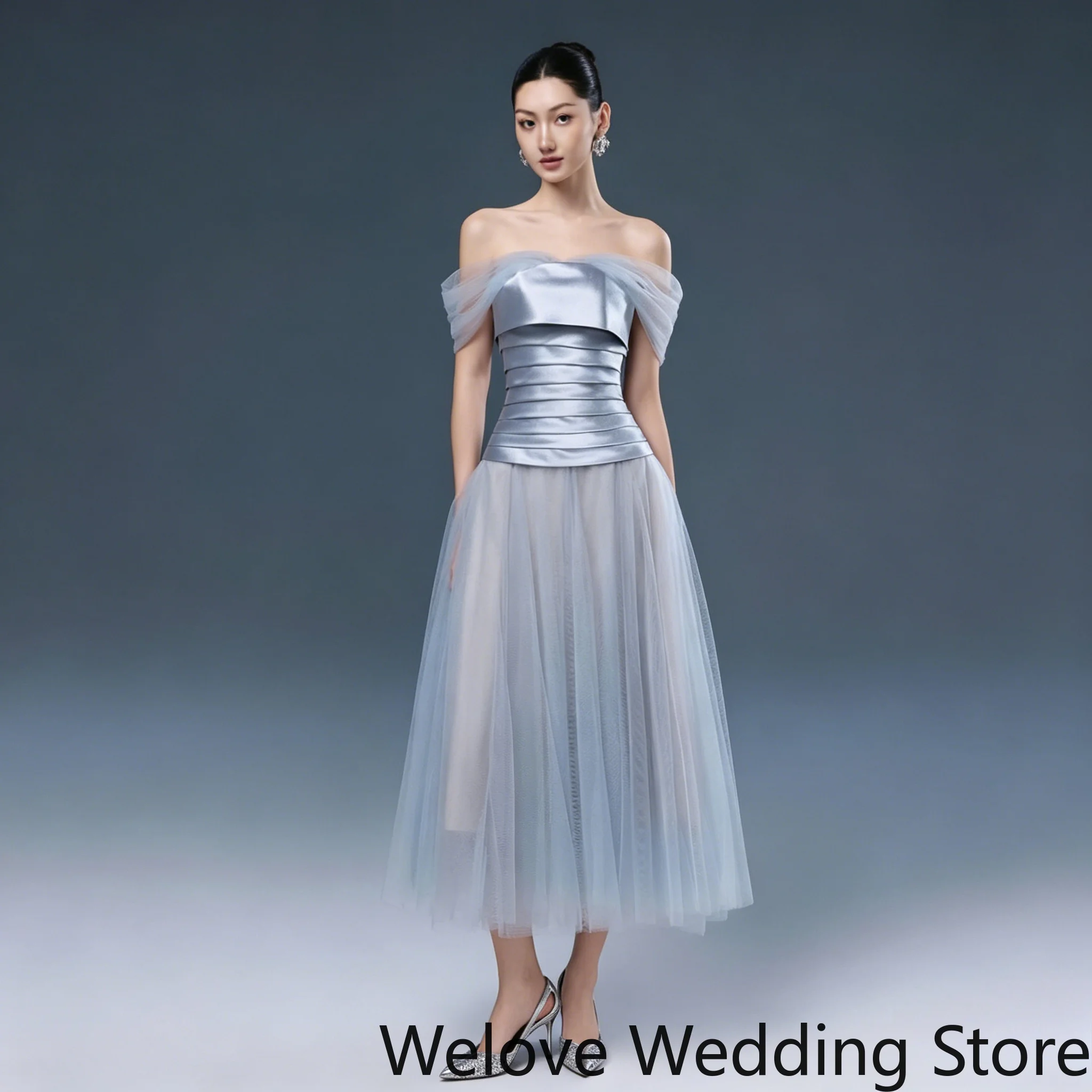 Whimsical Light Blue Formal Midi Dress featuring an elegant off-shoulder neckline, a ruched satin bodice for a tailored fit
Whimsical Light Blue Formal Midi Dress featuring an elegant off-shoulder neckline, a ruched satin bodice for a tailored fit