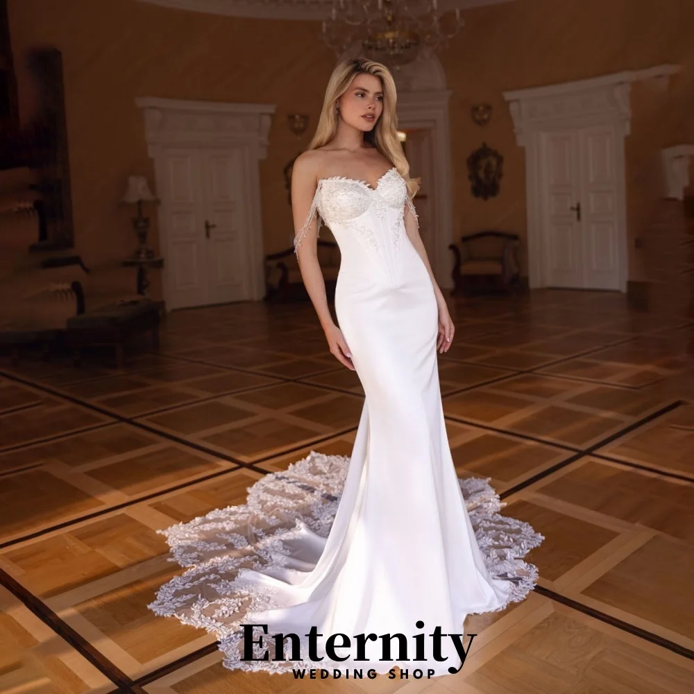 Customized Elegant Sweetheart Beading Wedding Dress Charming Lace Applique Zipper Bridal Gown for Women with Off The Shoulder
Customized Elegant Sweetheart Beading Wedding Dress Charming Lace Applique Zipper Bridal Gown for Women with Off The Shoulder