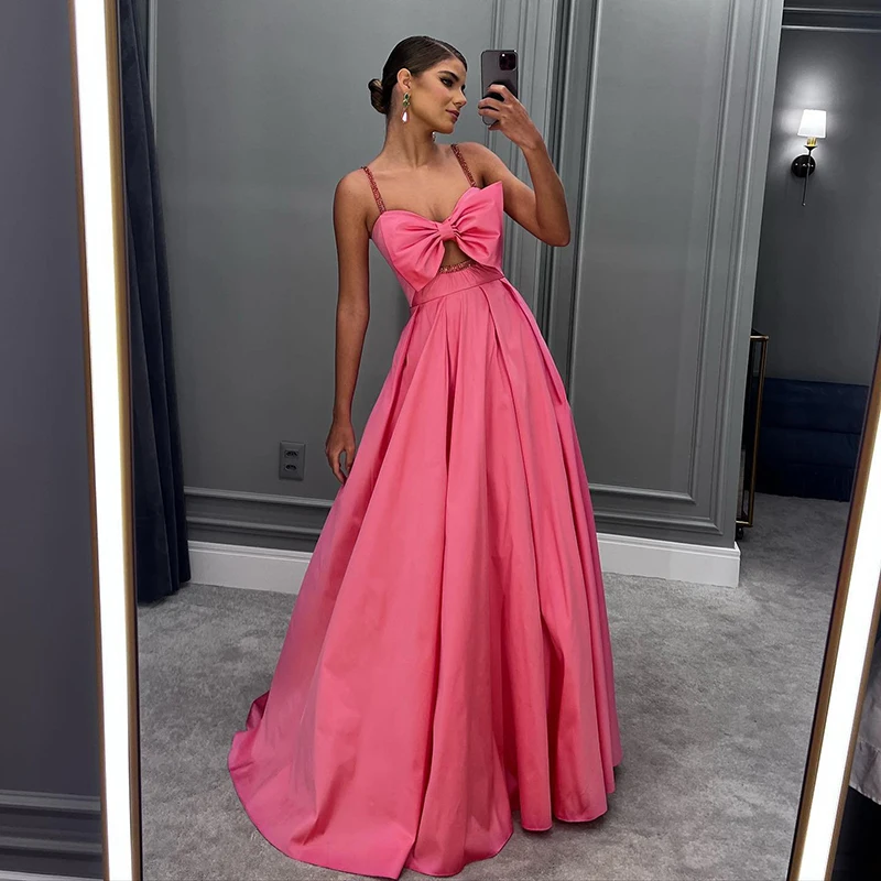 2023 Pink A-Line Long Formal Prom Dresses With Bow Evening Dress Spaghetti Straps Saudi Arabia Cocktail Party Gowns Custom Size
2023 Pink A-Line Long Formal Prom Dresses With Bow Evening Dress Spaghetti Straps Saudi Arabia Cocktail Party Gowns Custom Size