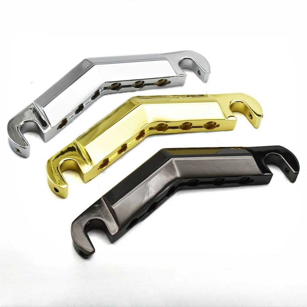 Integrated Guitar Bridge Tailpiece with Rear-Mounted String Holder, All-in-One Bridge and Saddle System for Electric Guitar
Integrated Guitar Bridge Tailpiece with Rear-Mounted String Holder, All-in-One Bridge and Saddle System for Electric Guitar