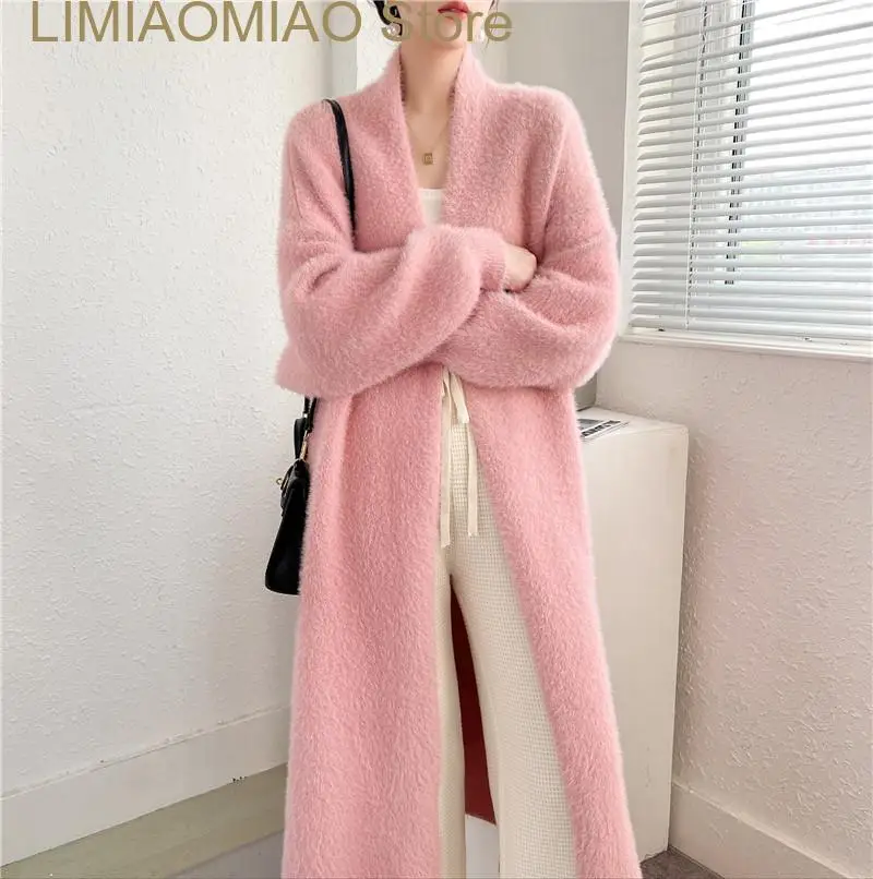 New European Designer Women's sweater outerwear Warm soft batwing sleeve Fashion women sweaters knitwear overcoats
New European Designer Women's sweater outerwear Warm soft batwing sleeve Fashion women sweaters knitwear overcoats