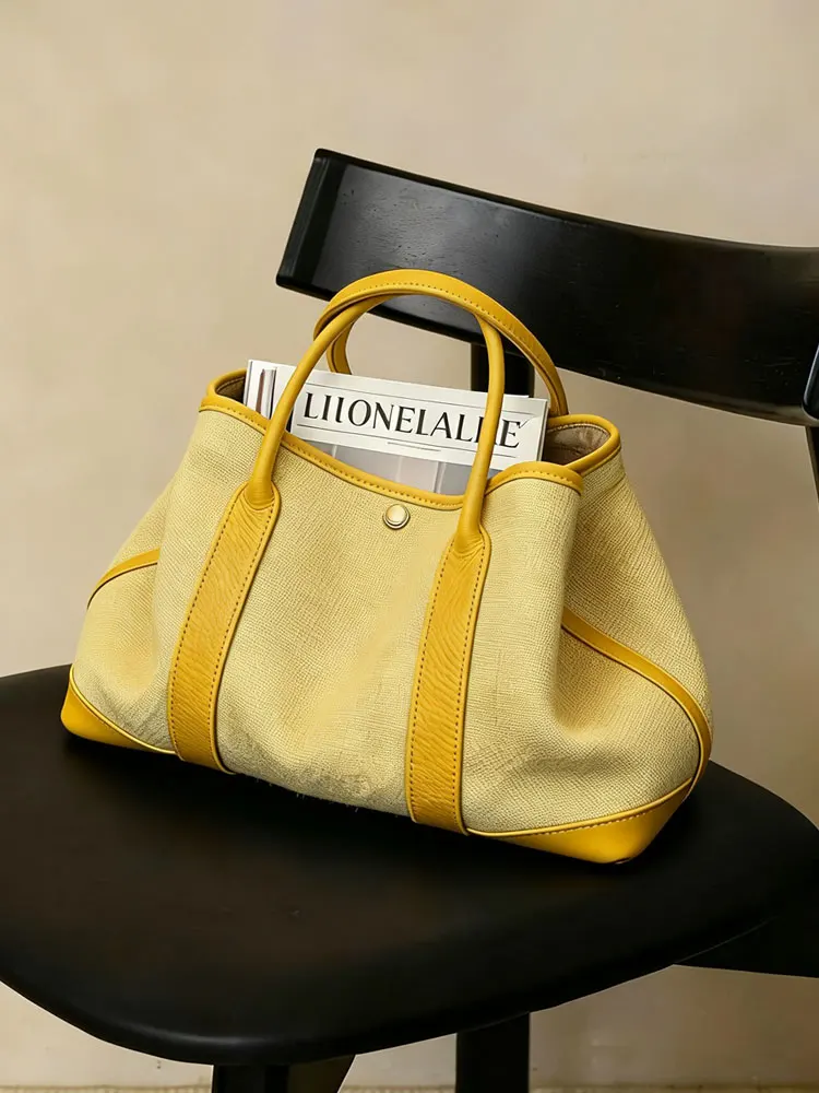 Yellow Linen Canvas Tote Bag Women's 2026 New Luxury Minimalist High-End Commuting Garden Bag Handheld Korean Style PU Leather
Yellow Linen Canvas Tote Bag Women's 2026 New Luxury Minimalist High-End Commuting Garden Bag Handheld Korean Style PU Leather