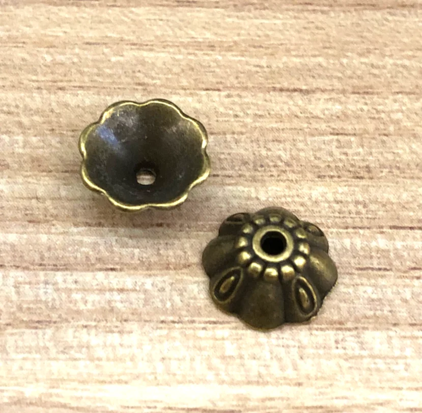 50pcs 9.3*4.2mm, hole 1.5mm Vinatge bead caps for handamde findings HW3828 Zinc alloy metal
50pcs 9.3*4.2mm, hole 1.5mm Vinatge bead caps for handamde findings HW3828 Zinc alloy metal