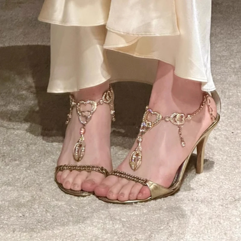 Gold Rhinestone Chain Open Toe Stiletto Heels Sandals Woman Summer 2026 Slingback Ankle Strap Women's Party Wedding Shoes
Gold Rhinestone Chain Open Toe Stiletto Heels Sandals Woman Summer 2026 Slingback Ankle Strap Women's Party Wedding Shoes
