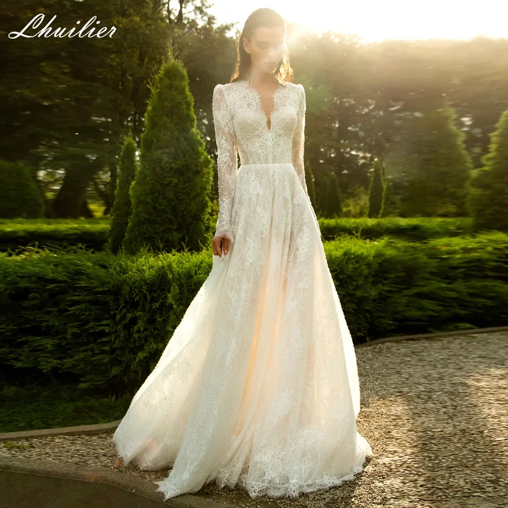 Lhuilier Индивидуальные кружевные свадебные платья с V-образным вырезом и бисером, иллюзорные свадебные платья со шлейфом
Lhuilier Индивидуальные кружевные свадебные платья с V-образным вырезом и бисером, иллюзорные свадебные платья со шлейфом
