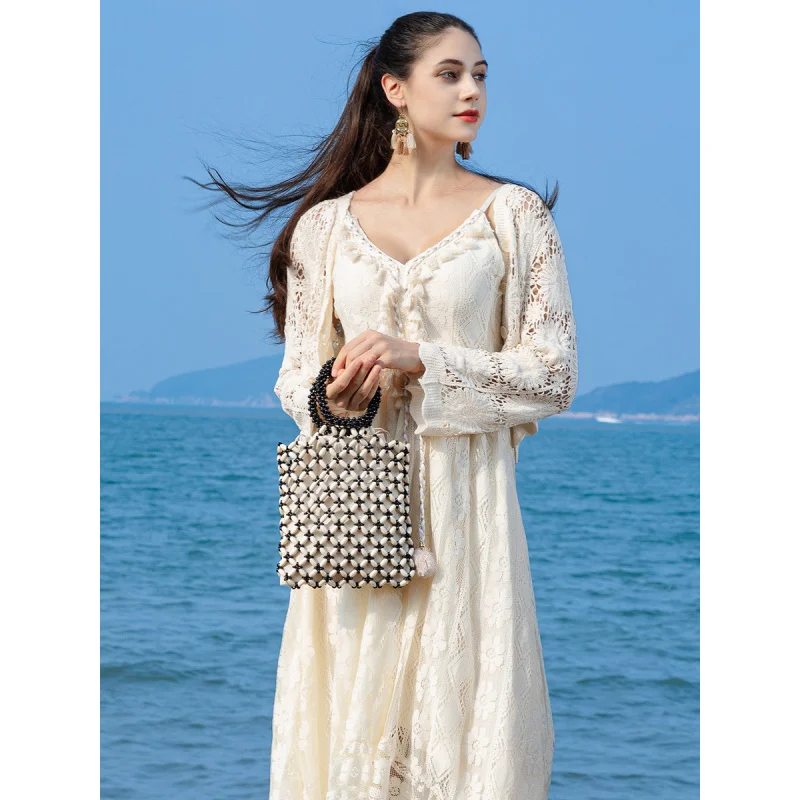 Handmade beaded handbag for women, beach vacation hollow wooden bead bag for women
Handmade beaded handbag for women, beach vacation hollow wooden bead bag for women