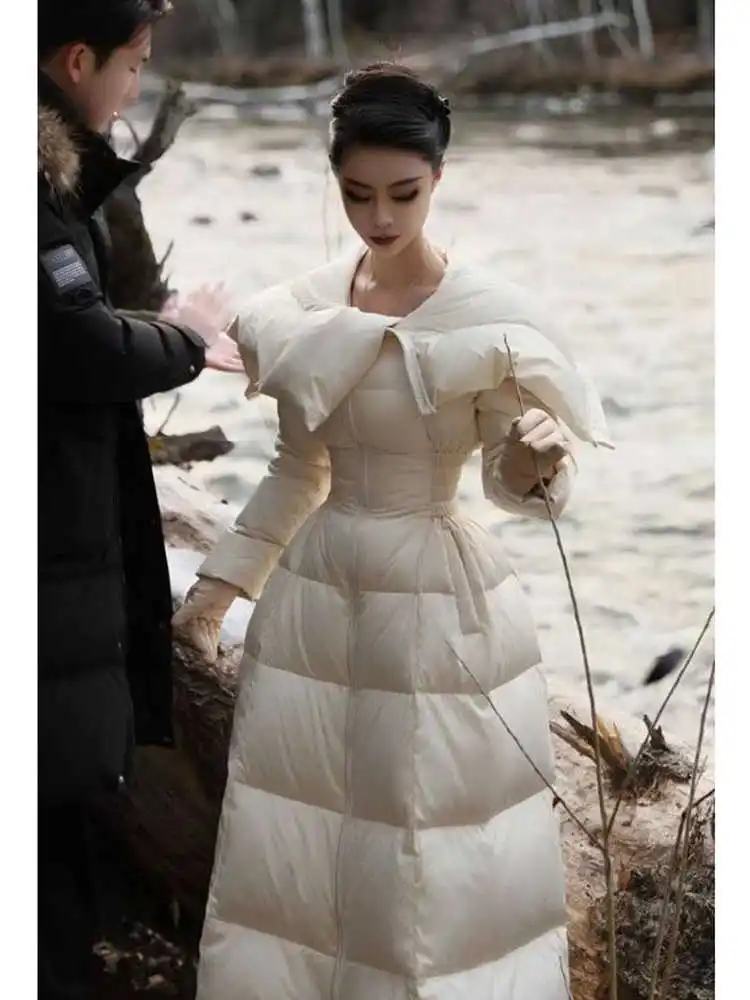 Winter New White Fleeing Princess Petal Collar Waist Inward Long Duck down Jacket Women's Fashion Princess Style Slim Fit Coat
Winter New White Fleeing Princess Petal Collar Waist Inward Long Duck down Jacket Women's Fashion Princess Style Slim Fit Coat