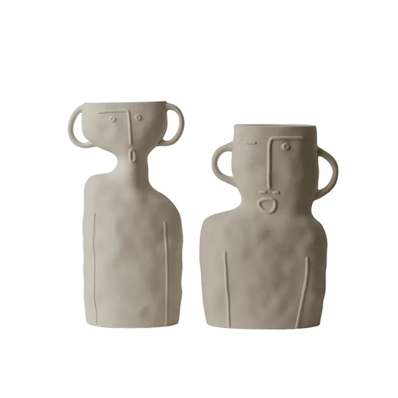 Creative ceramic cute face vase dining table ornament model room handicraft display decoration
Creative ceramic cute face vase dining table ornament model room handicraft display decoration