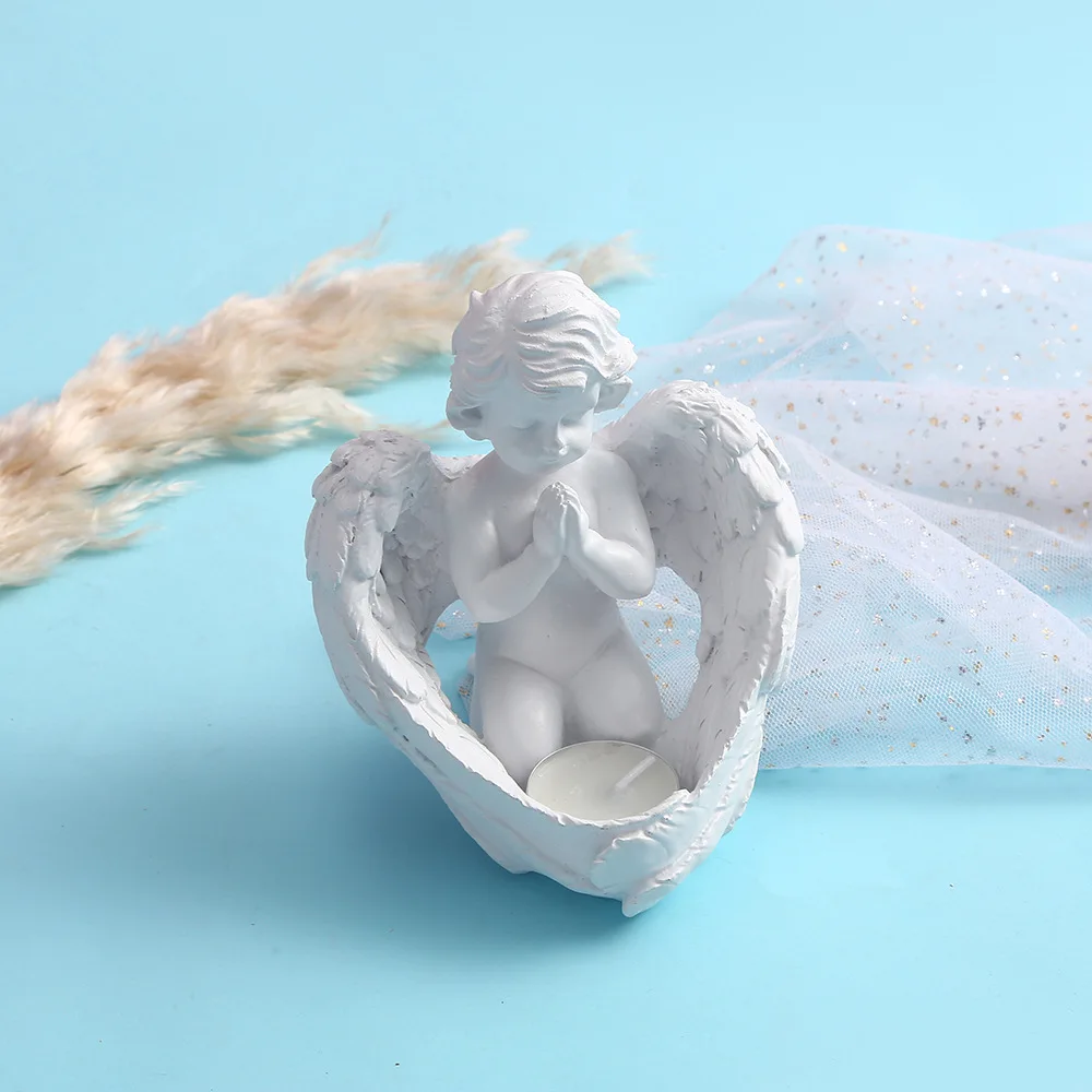 Cute angel candle holder table top resin craft ornament entrance candle cup ornament
Cute angel candle holder table top resin craft ornament entrance candle cup ornament