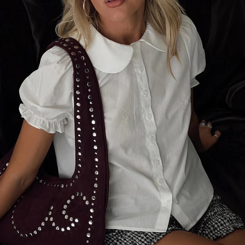 Streetwear White Buttons Peter Pan Collar Shirts Office Lady Short Puff Sleeve Woman Blouse 2026 Summer Casual Ruffles Shirts
Streetwear White Buttons Peter Pan Collar Shirts Office Lady Short Puff Sleeve Woman Blouse 2026 Summer Casual Ruffles Shirts