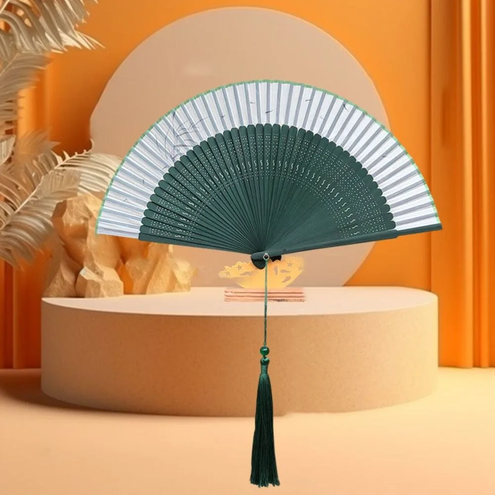 Classical Ancient Folding Fan Chinese Style Handhold Dance Fan Carved with Tassel Cheongsam Fan Wedding
Classical Ancient Folding Fan Chinese Style Handhold Dance Fan Carved with Tassel Cheongsam Fan Wedding