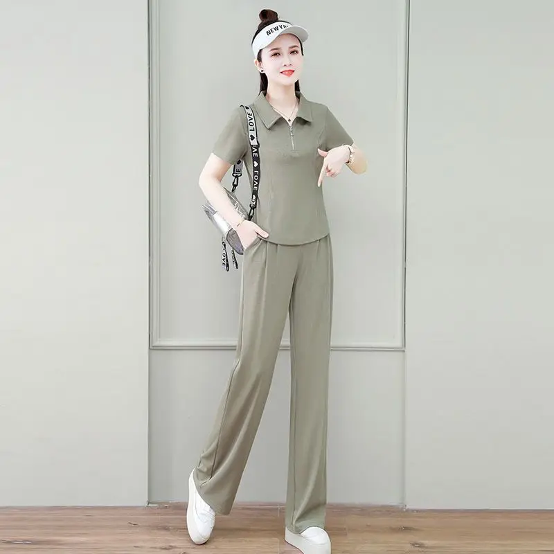 Casual Sports Suit Women's 2025 Summer New Loose Lapel Short-sleeved Top and Wide-leg Pants 2 Two-piece Set Korean Style Fashion
Casual Sports Suit Women's 2025 Summer New Loose Lapel Short-sleeved Top and Wide-leg Pants 2 Two-piece Set Korean Style Fashion