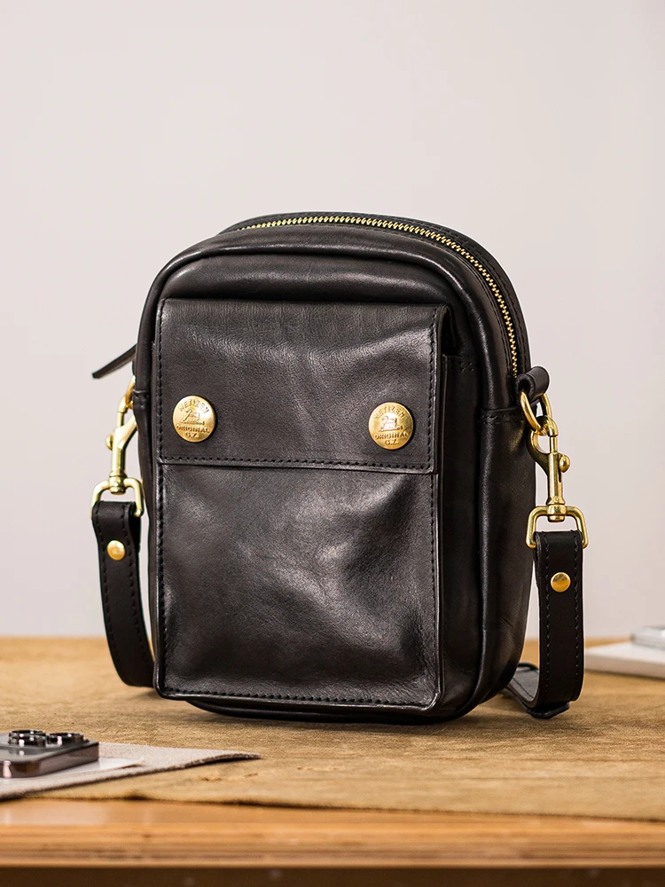 High-quality first layer cowhide men's small phone bag outdoor designer handmade genuine leather black shoulder crossbody bag
High-quality first layer cowhide men's small phone bag outdoor designer handmade genuine leather black shoulder crossbody bag