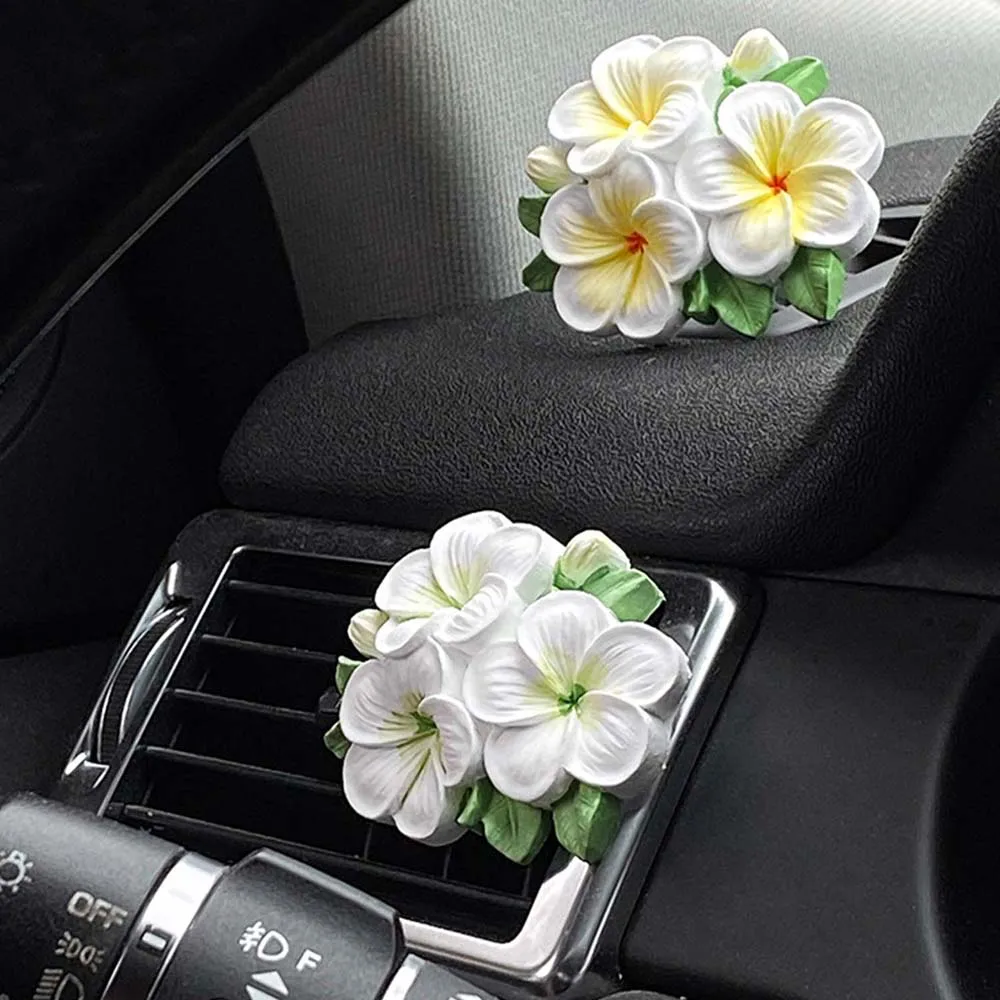 Car gypsum flower aromatherapy air outlet perfume ornament removes odors car pendant accessories aromatherapy wholesale
Car gypsum flower aromatherapy air outlet perfume ornament removes odors car pendant accessories aromatherapy wholesale