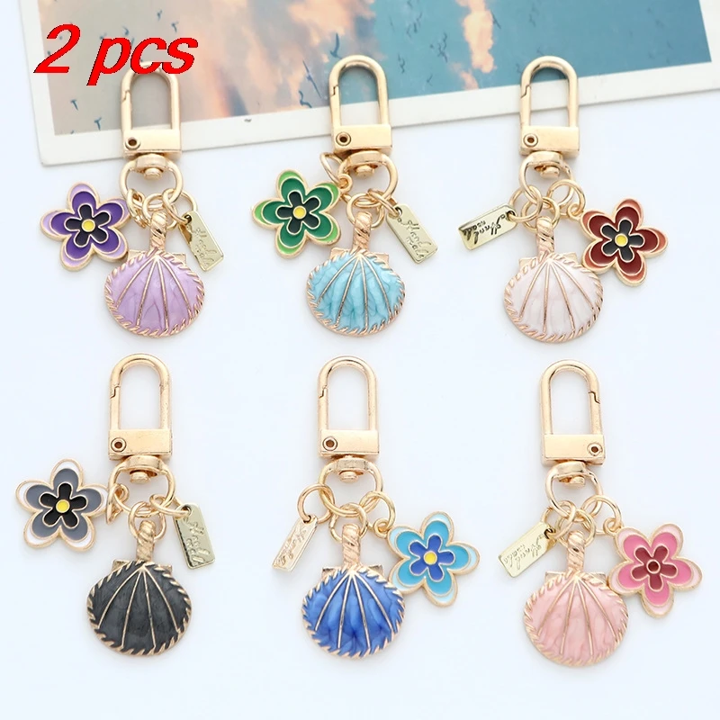 Женская сумка с подвесками, комплект из 2 шт., новые металлические креативные красочные ракушки с цветами, милые аксессуары для сумок Kawaii, многофункциональные брелки
Женская сумка с подвесками, комплект из 2 шт., новые металлические креативные красочные ракушки с цветами, милые аксессуары для сумок Kawaii, многофункциональные брелки