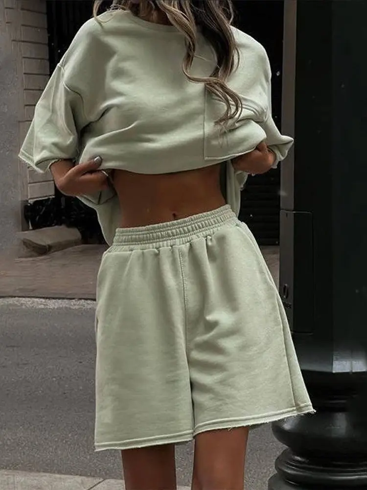 Loose Casual Women's Summer round Ne ort Sve T-irt orts Set Pure Color ket Two Piece Suit Comfortable Breathable
Loose Casual Women's Summer round Ne ort Sve T-irt orts Set Pure Color ket Two Piece Suit Comfortable Breathable