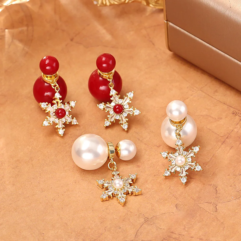 Fashionable and exquisite ultra-shiny zircon snowflake pearl earrings red one-piece earrings niche light luxury design earrings
Fashionable and exquisite ultra-shiny zircon snowflake pearl earrings red one-piece earrings niche light luxury design earrings
