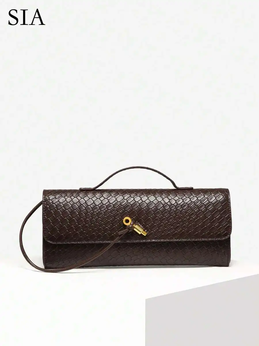 Brown Snake-Embossed Clutch with Top Handle and Detachable Strap
Brown Snake-Embossed Clutch with Top Handle and Detachable Strap