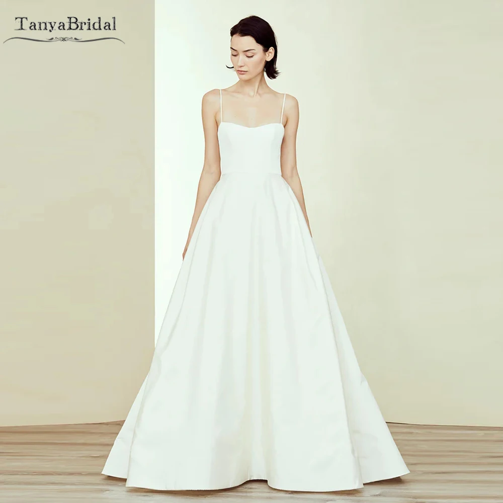 Spaghetti Strap Wedding Dresses With Full Pleated Skirt Simple Elegant A Line Bridal Gowns DW756
Spaghetti Strap Wedding Dresses With Full Pleated Skirt Simple Elegant A Line Bridal Gowns DW756