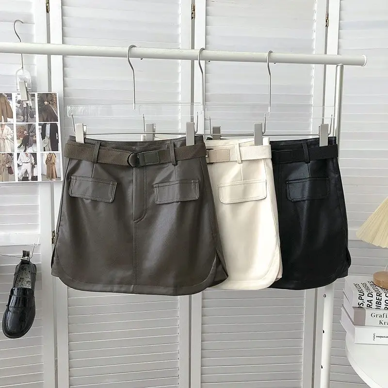 Casual Korean Style PU Leather Skirts For Women Summer High Waist Short Skirt With Belt Black White A-line Skirt Pocket Design
Casual Korean Style PU Leather Skirts For Women Summer High Waist Short Skirt With Belt Black White A-line Skirt Pocket Design