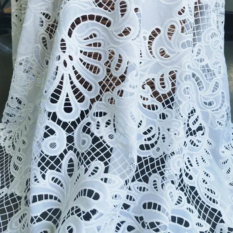 High-quality beautiful white milk silk embroidered hollow lace cotton fabric for wedding dresses,clothing,DIY sewing fabric
High-quality beautiful white milk silk embroidered hollow lace cotton fabric for wedding dresses,clothing,DIY sewing fabric