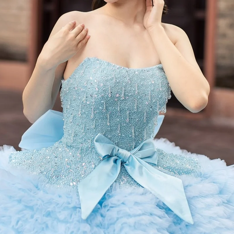 Light Blue Quinceanera Dress Crystal Sequins Decal Long tail Lace Layering off-shoulder Bow Vestidos De 15 Quinceanera Customiz
Light Blue Quinceanera Dress Crystal Sequins Decal Long tail Lace Layering off-shoulder Bow Vestidos De 15 Quinceanera Customiz