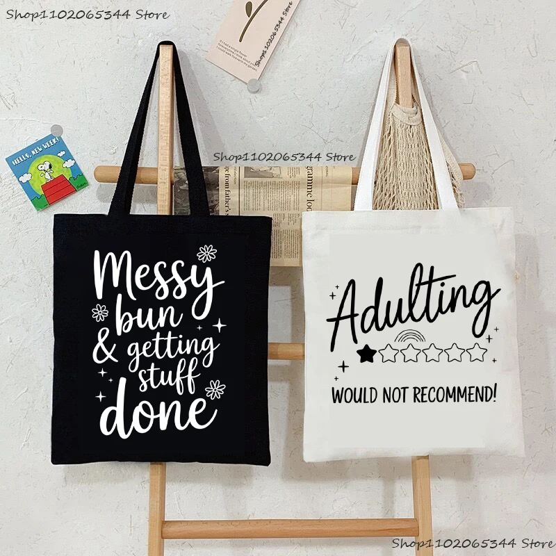 "Messy Bun & Getting Stuff Done" Minimalist Print Women's Handbags Fashion Humor Casual Canvas Shoulder Bag
"Messy Bun & Getting Stuff Done" Minimalist Print Women's Handbags Fashion Humor Casual Canvas Shoulder Bag