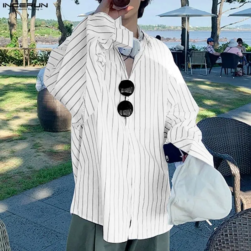 INCERUN Мужская полосатая рубашка с лацканами и длинным рукавом, свободная мужская одежда, уличная одежда, топы в корейском стиле, модные мужские рубашки для отдыха, S-5XL
INCERUN Мужская полосатая рубашка с лацканами и длинным рукавом, свободная мужская одежда, уличная одежда, топы в корейском стиле, модные мужские рубашки для отдыха, S-5XL