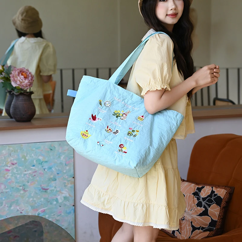 Korean Cute Embroidered Single-Shoulder Bag Versatile Casual DrawstringTote Large Capacity Candy Color Women's Fashion Sling Bag
Korean Cute Embroidered Single-Shoulder Bag Versatile Casual DrawstringTote Large Capacity Candy Color Women's Fashion Sling Bag
