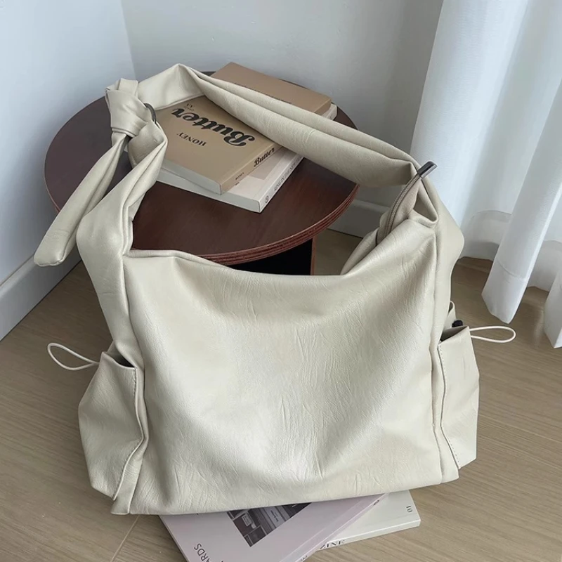 Soft PU Leather Women's Shoulder Bags Vintage Knotted Strap Crossbody Bag Simple Casual Large Capacity Female Work Tote Handbags
Soft PU Leather Women's Shoulder Bags Vintage Knotted Strap Crossbody Bag Simple Casual Large Capacity Female Work Tote Handbags