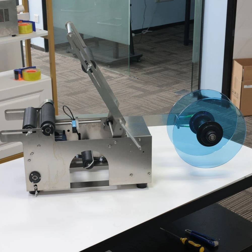 MT-50 Semi Automatic Glass Vial Tin Can Plastic Round Bottle Sticker label printing machine With Date code printer
MT-50 Semi Automatic Glass Vial Tin Can Plastic Round Bottle Sticker label printing machine With Date code printer