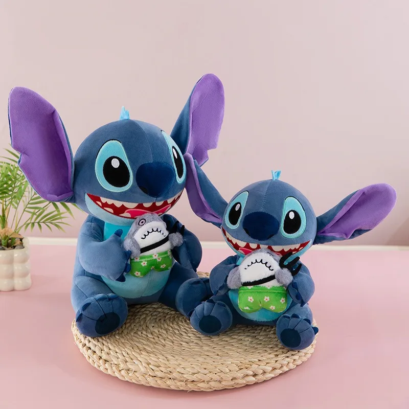 Kawaii Stitch плюшевая игрушка милая наполненная кукла акула и стежка чучело детский подарок на день рождения для детей развлекательная машина приз
Kawaii Stitch плюшевая игрушка милая наполненная кукла акула и стежка чучело детский подарок на день рождения для детей развлекательная машина приз