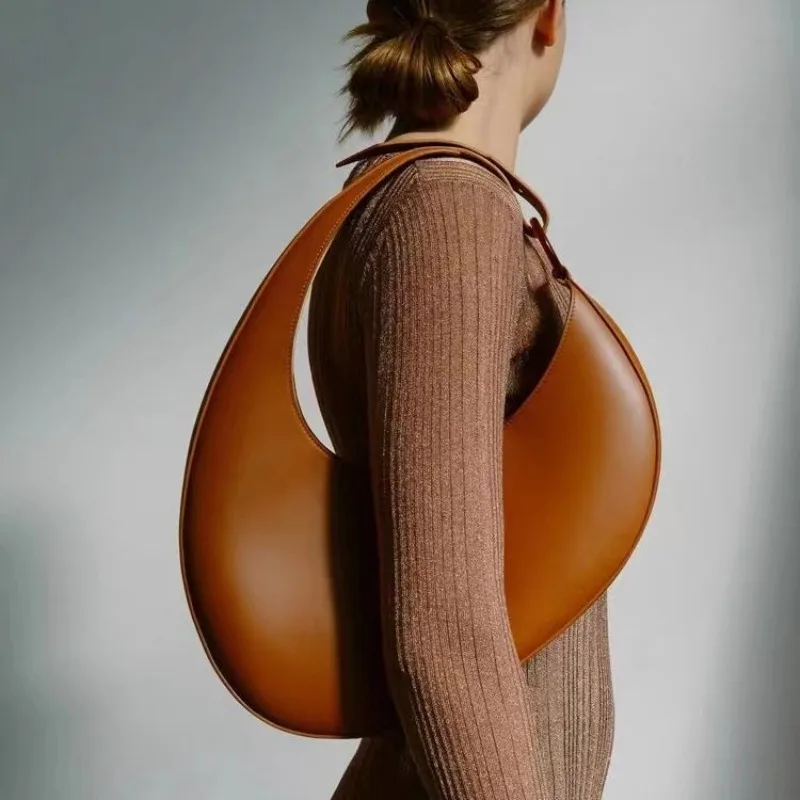 Niche design handbag 2025 new trend tide personalized crescent-shaped large-capacity underarm bag shoulder bags
Niche design handbag 2025 new trend tide personalized crescent-shaped large-capacity underarm bag shoulder bags