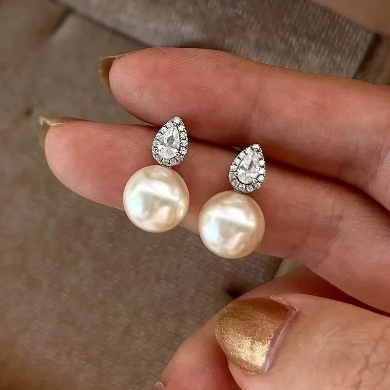 Elegant Pearl Water Drop Diamonds Earrings for Women Sterling Silver 925 Ladies' Exquisite Fine Jewelry High Grade Bijoux Party
Elegant Pearl Water Drop Diamonds Earrings for Women Sterling Silver 925 Ladies' Exquisite Fine Jewelry High Grade Bijoux Party