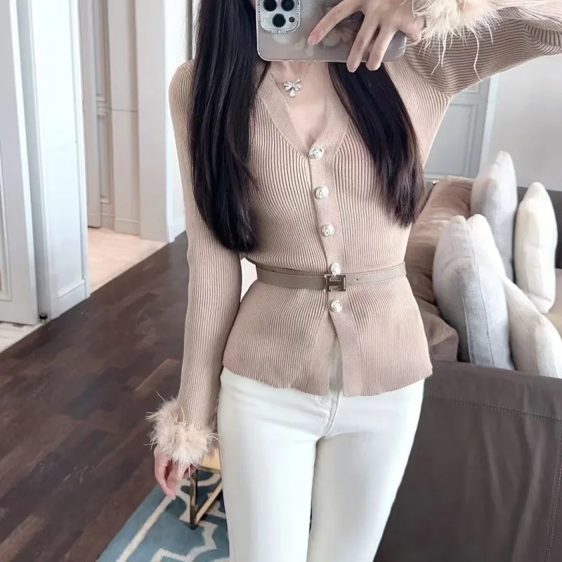 LXYG High-End V-Neck Knitted Cardigan with Ostrich Feather Sleeves Slimming Design And Waist Belt for Women Elegant Top
LXYG High-End V-Neck Knitted Cardigan with Ostrich Feather Sleeves Slimming Design And Waist Belt for Women Elegant Top