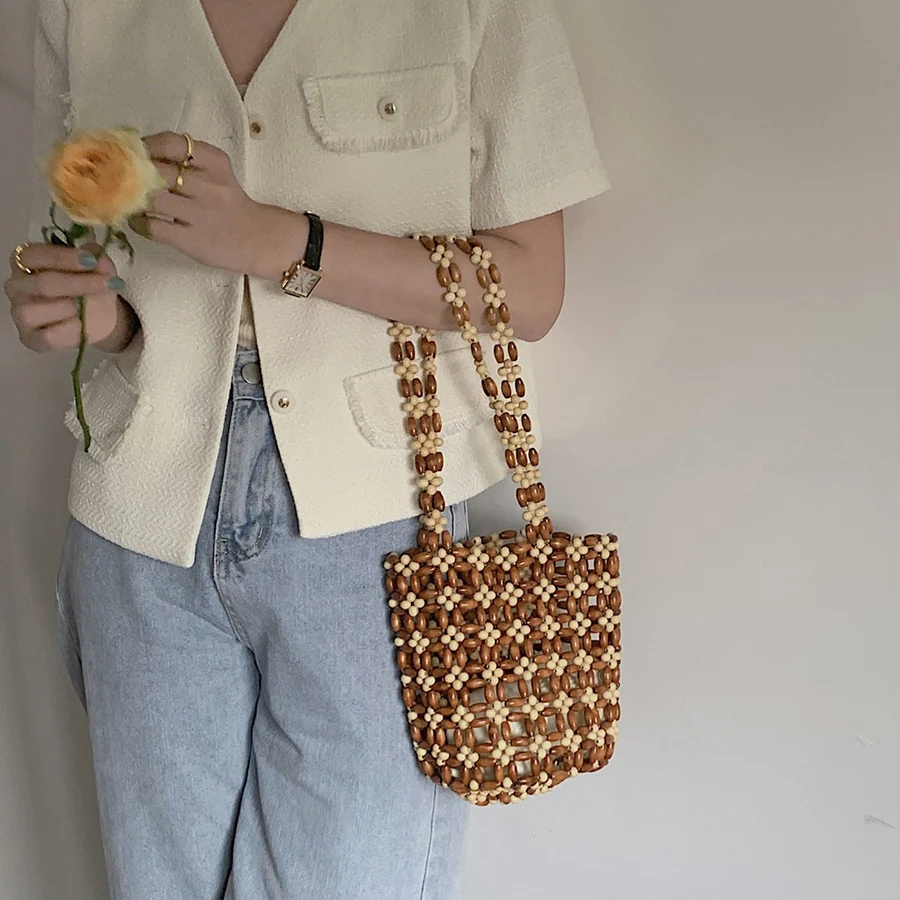 Summer Handmade beaded bucket bags women patchwork design coffee small handbags hollow out vacation beach bags yote clutch purse
Summer Handmade beaded bucket bags women patchwork design coffee small handbags hollow out vacation beach bags yote clutch purse
